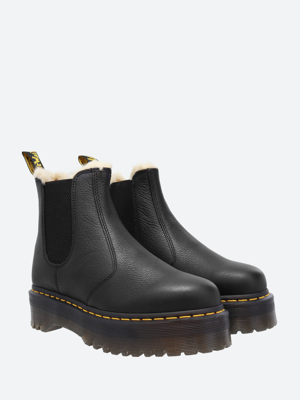 Black dr martens shop with fur lining